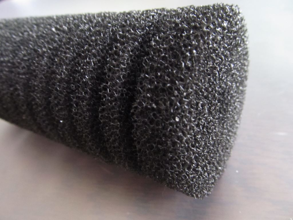 Close view of porous aquarium sponge-filter foam used as biological filter media